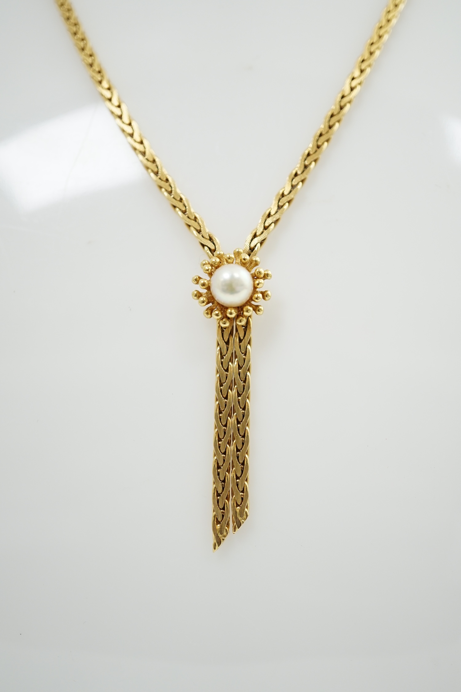 A modern 18k gold chevron close link and single stone cultured pearl set necklace